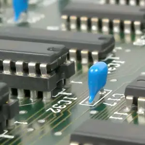 A picture of a number of electronic chips mounted on a PCB.