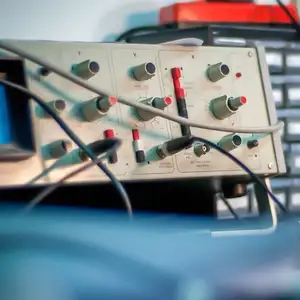 A picture of some electronic test equipment placed on top of a work bench