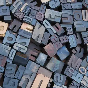 A picture showing a pile of type faces as used in an old fashion printing press